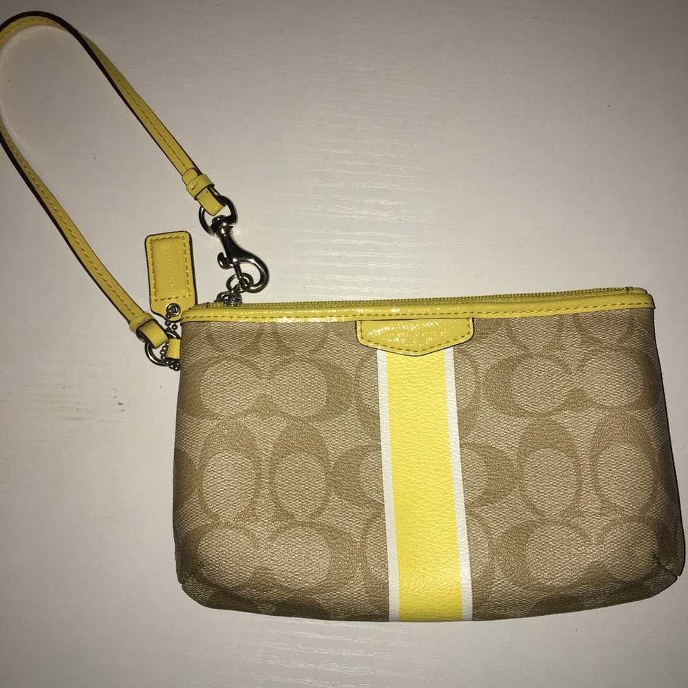 Coach yellow and beige wristlet